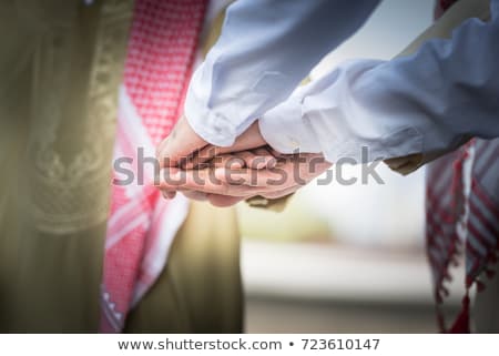 Stockfoto: Business People Putting Their Hands Together Concept Of Integration Teamwork And Partnership