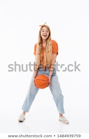 Сток-фото: Full Length Portrait Of Excited Girl 20s Playing Basketball Aga