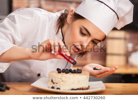 Stockfoto: Young Chef Preparing Lunch