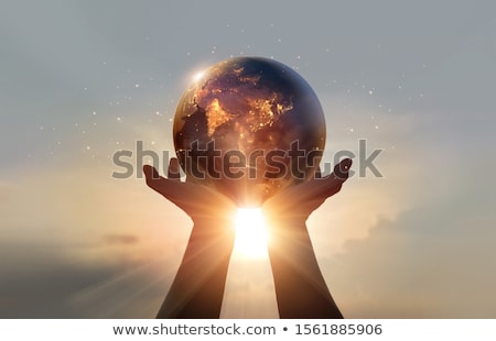 Stock photo: World In Hands With Sky