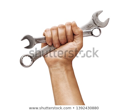 Foto stock: Man Holding A Tool In The Hands