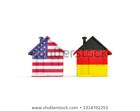 Zdjęcia stock: Two Houses With Flags Of United States And Germany