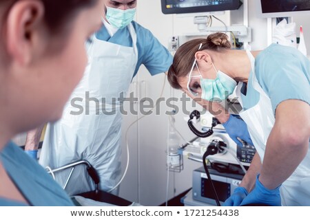 Stock photo: Proctologist In Surgery Of Hospital Performing Colonoscopy