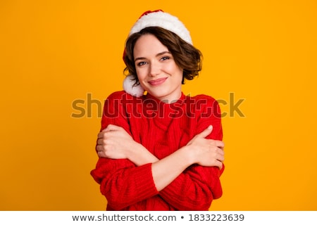 Zdjęcia stock: Happy Woman With Christmas Santa Claus Hat In Cheerful Mood