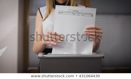 [[stock_photo]]: Secretary And Director Of Studying Documents