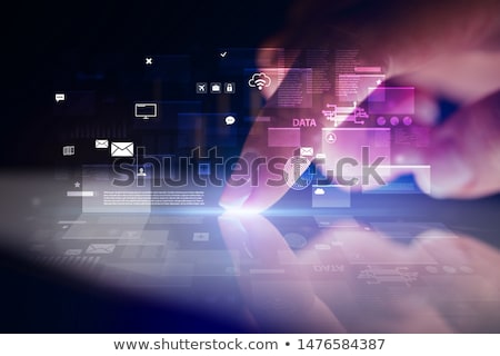 Stockfoto: Finger Touching Tablet With Global Database Concept