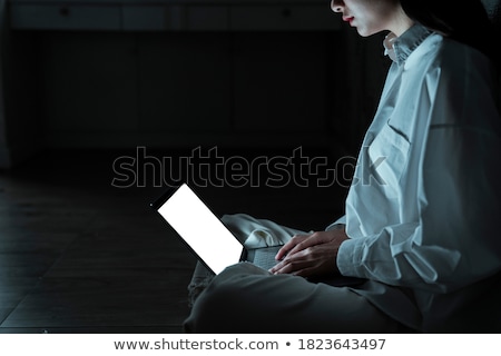 Foto stock: Futuristic Cyborg In Dark Room