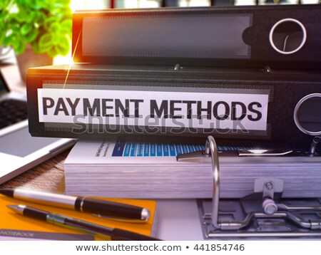 Stock photo: Payment Methods On Black Ring Binder Blurred Toned Image