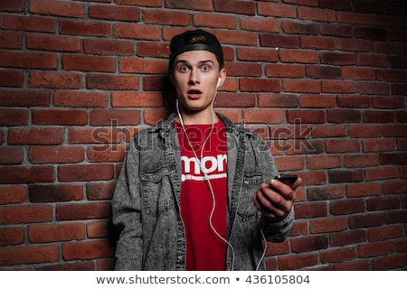 Foto stock: Man With Phone Mp3 From Profile