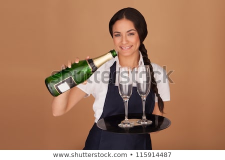 Stockfoto: Two Brunettes Pouring Champagne