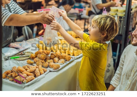 Stock fotó: Dad And Son Are Tourists On Walking Street Asian Food Market