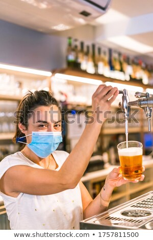 Stok fotoğraf: Waitress With Beer