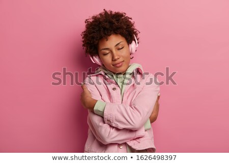 Zdjęcia stock: Woman Eyes Shut Listening To Music