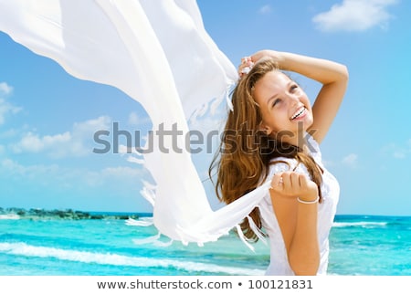 Stock foto: Happy Young Woman With Scarf On Tropical Beach