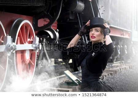 Stockfoto: The Beautiful Girl In A Black Hat