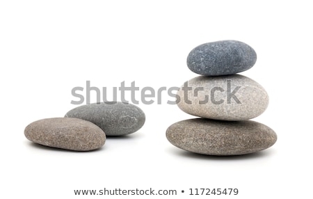Stock photo: Piled Up Pebbles On A White Background