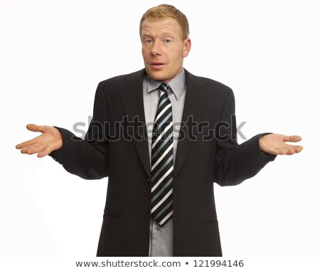 Stock photo: Clueless Businessman Posing Against A White Background