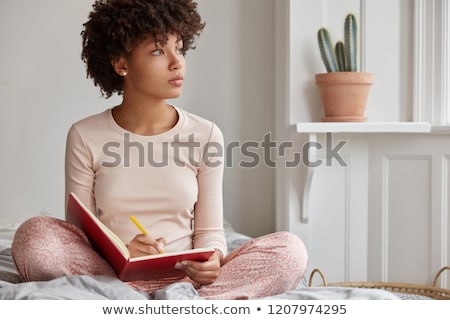 商業照片: Woman Writing In A Journal