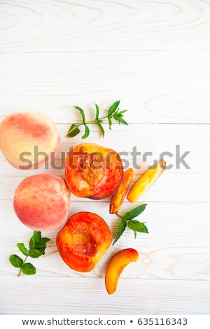 Сток-фото: Fresh Peaches With Mint On Wooden White Background