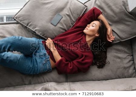 Foto stock: Top View Of A Smiling Beautiful Asian Woman In Sweater