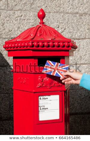 Сток-фото: Person Putting Postcard In Post Box London