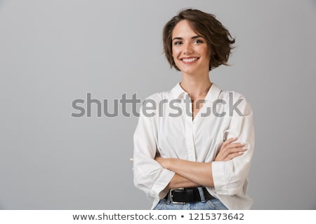 ストックフォト: Business Young Woman Posing Isolated Over Grey Wall Background Using Laptop Computer