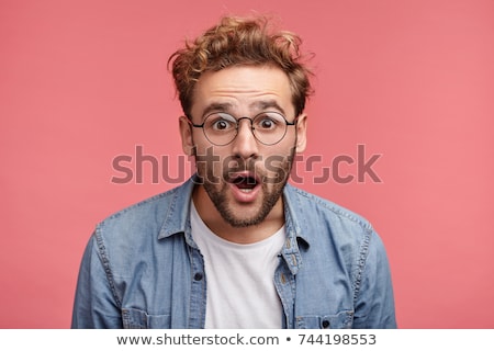 [[stock_photo]]: Portrait Of Amazed Bearded Excited Male Looks With Surprisment I