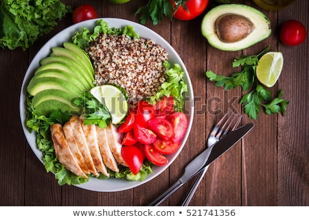 Stockfoto: Mixed Green Salad With Quinoa And Avocado On Wood Background Healthy Food Concept Vegetarian Food C
