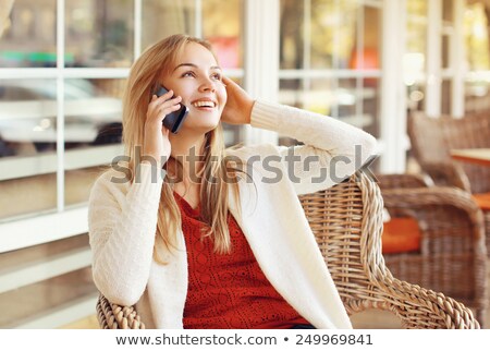 Stock photo: Beautiful Girl Talks On The Phone In European City