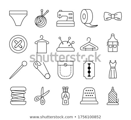 Foto stock: A Line Of Sewing Pins Over White