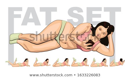 Stock photo: Girl In Bikini Lying On The Bed And Using Smartphone