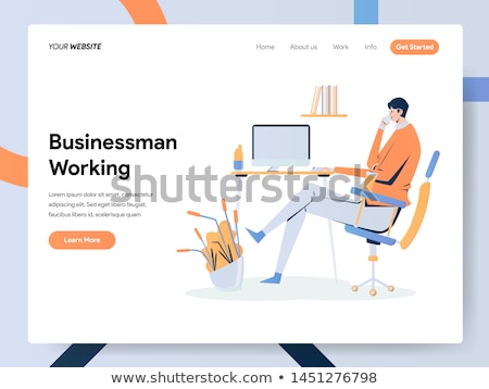 [[stock_photo]]: Businessman Sitting At A Desk