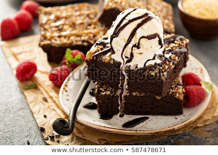 Stock fotó: Chocolate Brownie With Ice Cream And Raspberries