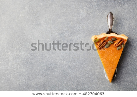 Stock foto: Tasty Pumpkin Pie Tart Made For Thanksgiving Day In A Baking Dish On A Cooling Rack Turquoise Wood