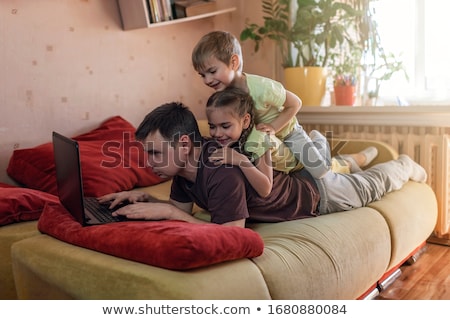 Foto stock: Boy And Girl With Connected Headphones