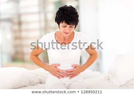 Stock fotó: Woman Having Stomach Pain