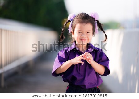 Stockfoto: Little Girl Being Photographed At Summer Park