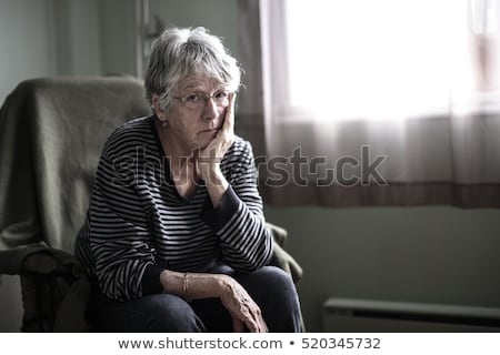 Worried Senior Woman At Home Felling Very Bad ストックフォト © Lopolo