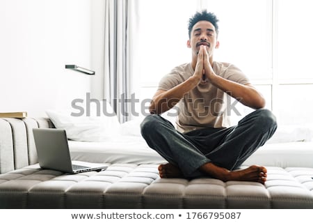 Stock photo: Handsome Young Man In Meditation