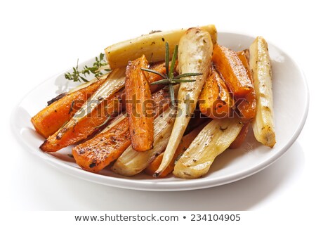 Stockfoto: Roasting Carrots And Parsnips With Thyme