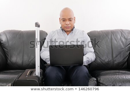 Foto stock: African Travel Businessman Working In Airport Vip Lounge