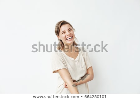 [[stock_photo]]: Attractive Young Blond Woman Looking At Camera