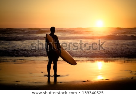 Surfers At Sunset Portugal [[stock_photo]] © homydesign