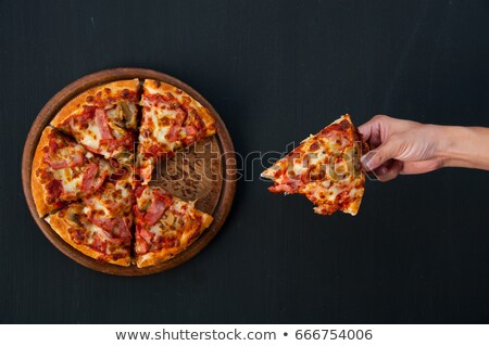 Stok fotoğraf: Hot Pizza In Hand