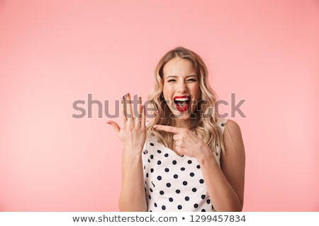 Imagine de stoc: Happy Woman Showing Engagement Ring