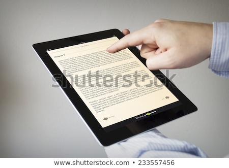 Foto d'archivio: Human Hand Connecting Digital Tablet To Keypad