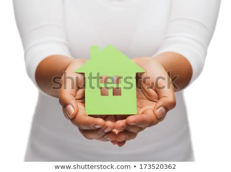 Zdjęcia stock: Hands Holding House With Green Recycling Sign