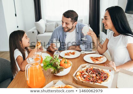 Foto stock: Having Dinner