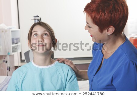 Foto d'archivio: Young Girl Get Measure In The Hospital Pediatrician