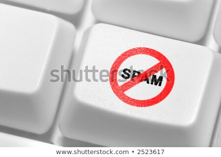 Stok fotoğraf: The Button With An Emblem Of An Antispam On The Keyboard